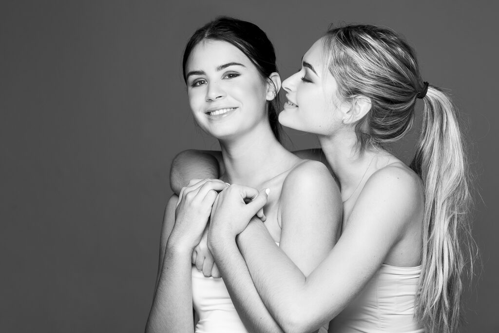 Family portrait, of teen sisters, shot in studio by Kevin Mark Pass Photography